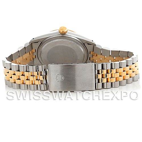 The image shows the back view of a Rolex Vintage Collection 16013 Men's Stainless Steel Silver Dial 16013 Men's Stainless Steel Silver Dial watch, highlighting its two-tone metal bracelet and clasp.