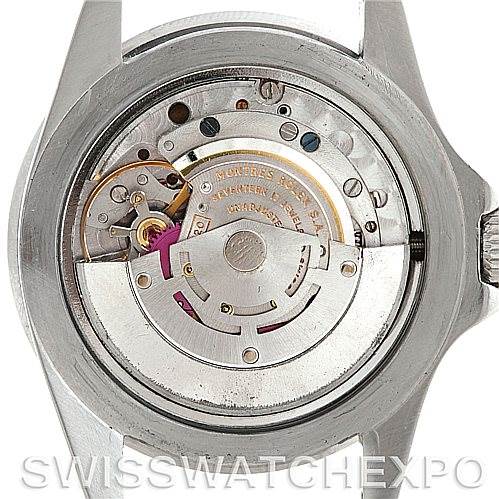 This image shows the movement of a Vintage Collection model by Rolex, viewed from the back with the caseback removed.