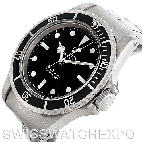 The image shows a Rolex Vintage Collection 5513 Men
s Stainless Steel Black Dial 5513 Men
s Stainless Steel Black Dial model watch angled to display the face, bezel, crown, and part of the bracelet.