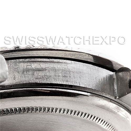 The image shows a close-up side view of the case and bezel engraving of a Vintage Collection model by Rolex.
