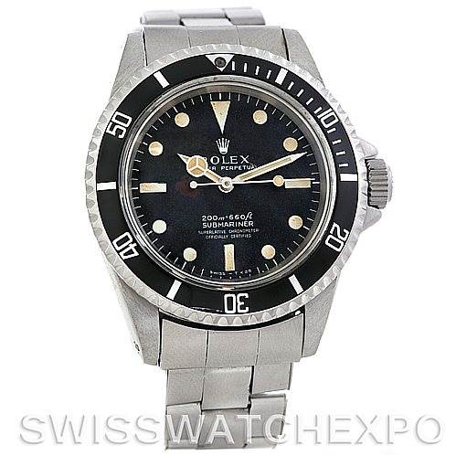 The image shows a front view of a Vintage Collection Rolex Submariner watch, highlighting its dial, bezel, and stainless steel bracelet.