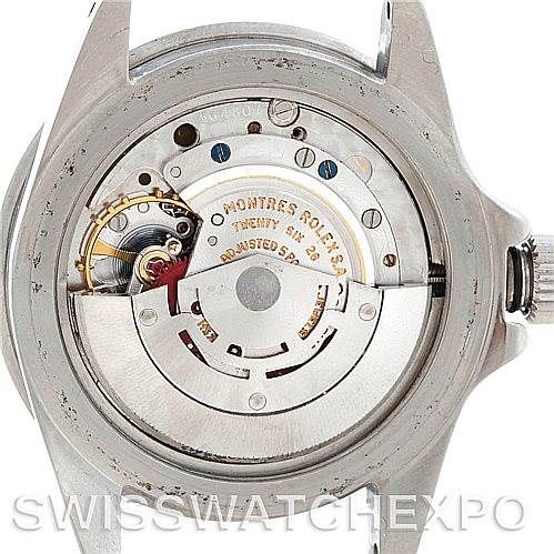 This image shows the back of a Vintage Collection Rolex watch, revealing its intricate movement mechanism.