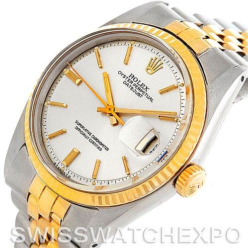 The image shows a Rolex Vintage Collection 1601 Men's Steel and Gold (two tone) Silver Dial 1601 Men's Steel and Gold (two tone) Silver Dial model, featuring its face, bezel, crown, and a portion of the bracelet at an angled view.