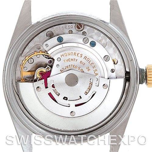 This image shows the inner mechanism of a Vintage Collection Rolex watch, viewed from the back with the case back removed.