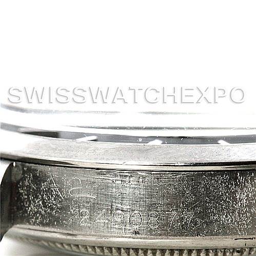 The image shows a close-up of the side and serial number of the Rolex Vintage Collection 5700 Men
s Stainless Steel Black Dial 5700 Men
s Stainless Steel Black Dial watch.