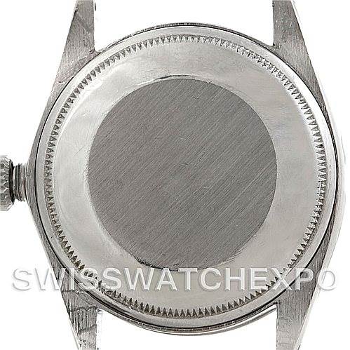 The image shows the back case of a Rolex Vintage Collection 5700 Men
s Stainless Steel Black Dial 5700 Men
s Stainless Steel Black Dial watch at a top-down angle.
