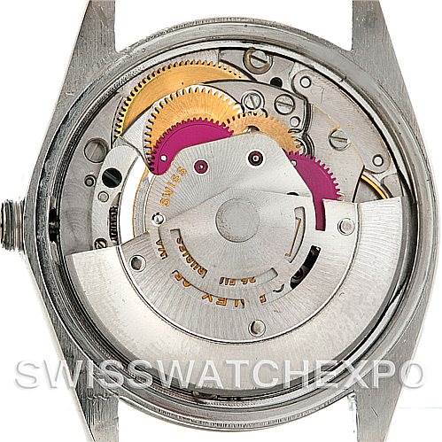 The image shows the internal movement mechanism of a Vintage Collection Rolex watch from a direct overhead angle.