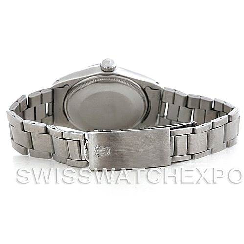 The image shows the back and bracelet of a Rolex Vintage Collection 5700 Men
s Stainless Steel Black Dial 5700 Men
s Stainless Steel Black Dial watch, highlighting the clasp and case back.