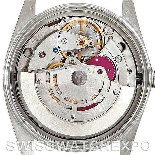The image shows the internal mechanism of a Rolex Vintage Collection 16013 Men's Stainless Steel Champagne Dial 16013 Men's Stainless Steel Champagne Dial model from the back angle, highlighting the movement and gears.