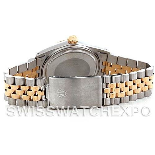 The image shows the back of a Rolex Vintage Collection 16013 Men's Stainless Steel Champagne Dial 16013 Men's Stainless Steel Champagne Dial watch, highlighting its two-tone bracelet and clasp.