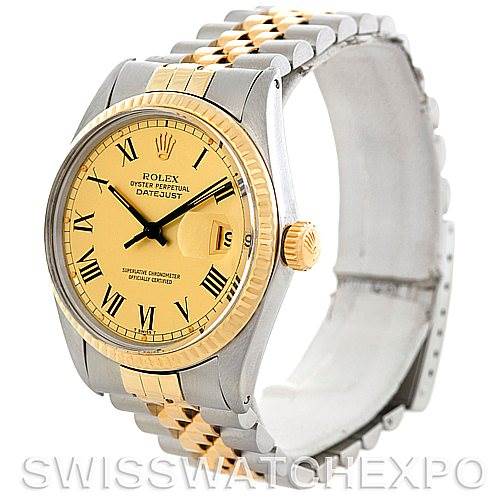 This image shows a Rolex Vintage Collection 16013 Men's Stainless Steel Champagne Dial 16013 Men's Stainless Steel Champagne Dial Datejust watch with a yellow gold and stainless steel bracelet, viewed from a front angle.
