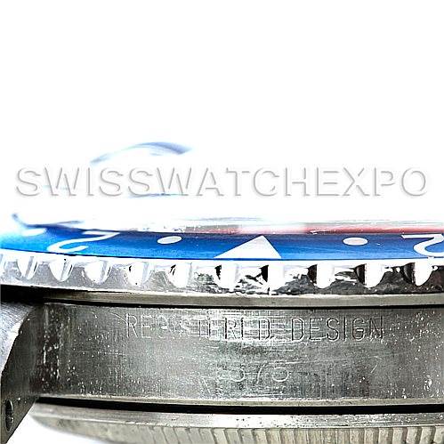 The image shows a close-up side view of a Vintage Collection Rolex watch bezel and part of the case with "REGISTERED DESIGN" engraved.