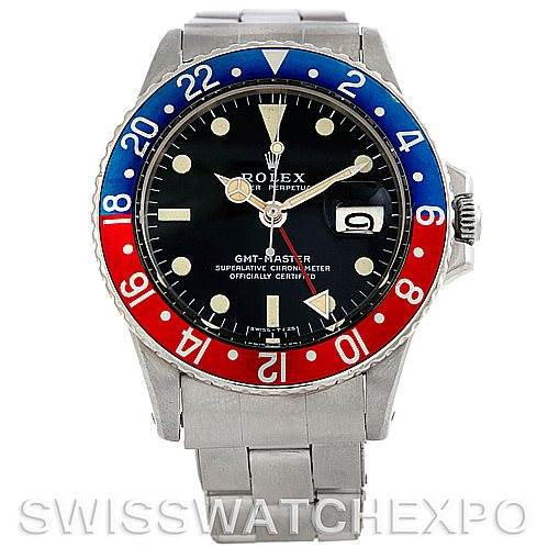 The image shows a front view of a Vintage Collection Rolex GMT-Master watch with a stainless steel bracelet and red/blue bezel.