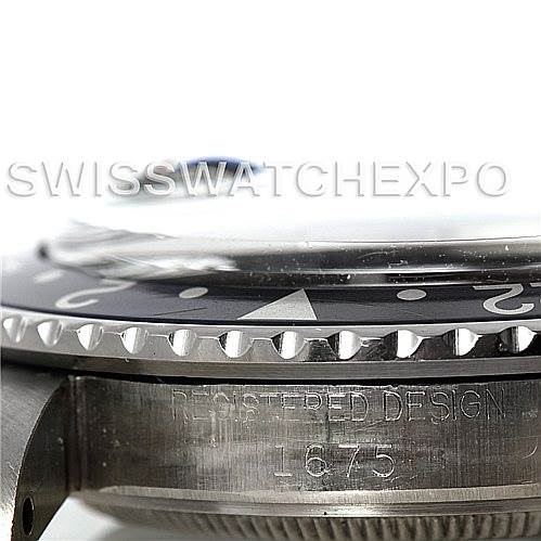 This image shows a side view of the bezel, crystal, and part of the case of a Vintage Collection Rolex watch.