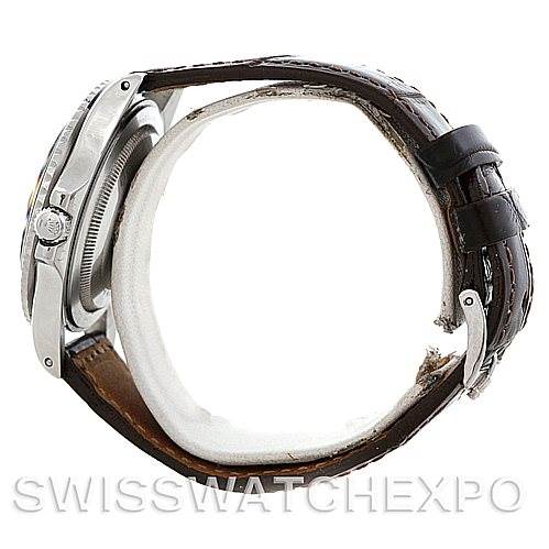 This Rolex Vintage Collection 1675 Men's Stainless Steel Black Dial 1675 Men's Stainless Steel Black Dial model is shown from a side angle, highlighting the crown, case, and brown leather strap.