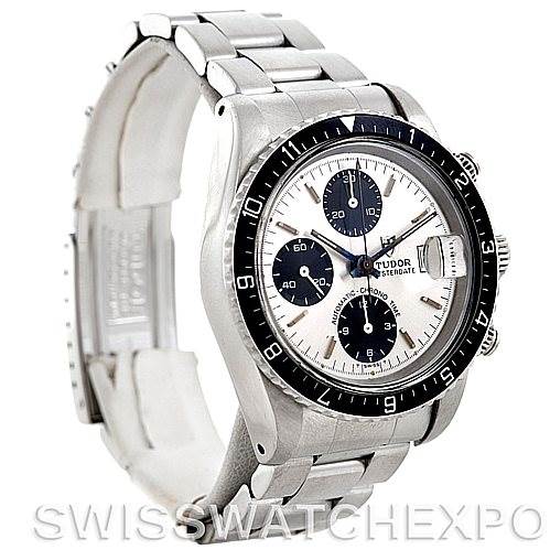 The image shows a side and front view of a Tudor by Rolex Vintage Collection 79170 Men
s Stainless Steel Silver Dial 79170 Men
s Stainless Steel Silver Dial watch, highlighting its bracelet and bezel.