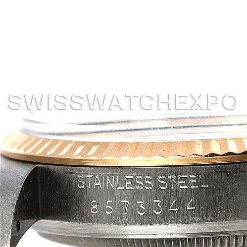 This is a close-up of the side profile of a Rolex Vintage Collection 16013 Men's Stainless Steel White Dial 16013 Men's Stainless Steel White Dial watch, showing the stainless steel casing and serial number.