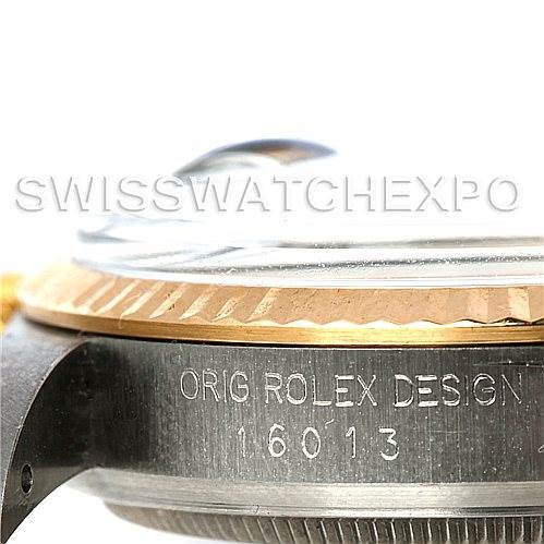 This image shows a close-up side view of the Rolex Vintage Collection 16013 Men's Stainless Steel White Dial 16013 Men's Stainless Steel White Dial watch, focusing on its bezel and engraved model number 16013.