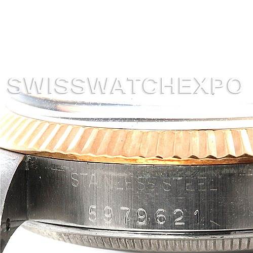 The image shows a close-up side view of the casing of a Rolex Vintage Collection 1500 Men's Steel and Gold (two tone) Black Dial 1500 Men's Steel and Gold (two tone) Black Dial watch, highlighting the serial number and "stainless steel" engraving.