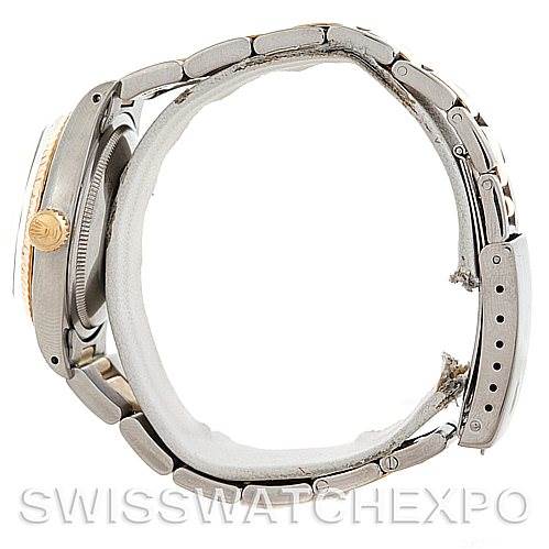 This image shows a side view of the Rolex Vintage Collection 1500 Men's Steel and Gold (two tone) Black Dial 1500 Men's Steel and Gold (two tone) Black Dial watch, highlighting its bracelet, case, crown, and clasp.