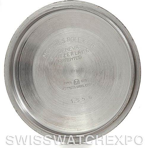 This image shows the inside of the case back of a Vintage Collection Rolex watch, highlighting engravings and inscriptions.