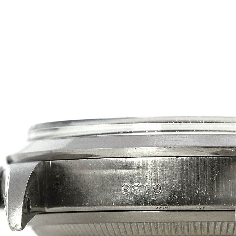 This close-up image shows the side view of the case and bezel of a Rolex Vintage Collection 6610 Men's Stainless Steel Black Dial 6610 Men's Stainless Steel Black Dial watch, including the model number 6610.