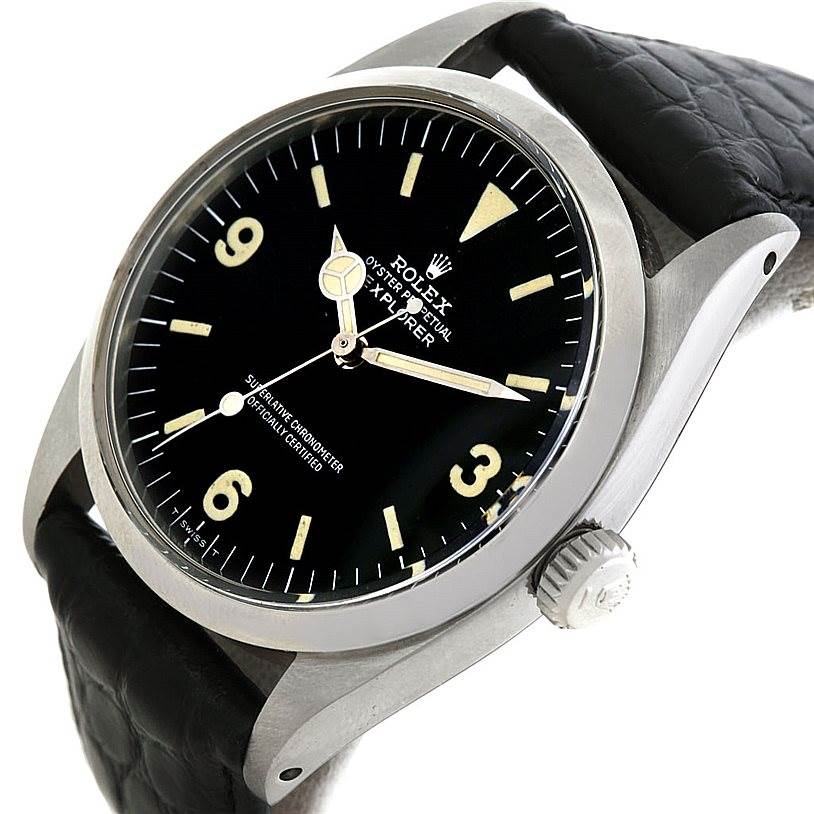 The image shows a close-up side angle of the Rolex Vintage Collection 6610 Men's Stainless Steel Black Dial 6610 Men's Stainless Steel Black Dial Explorer watch, highlighting the black dial, crown, and part of the leather strap.