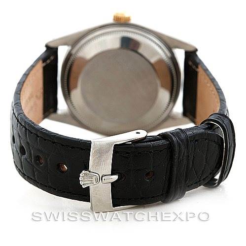 The image shows the back case and black leather strap of the Rolex Vintage Collection 5701 Men
s Stainless Steel Champagne Dial 5701 Men
s Stainless Steel Champagne Dial watch.