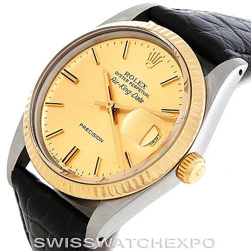 The image shows a side angle view of a Rolex Vintage Collection 5701 Men
s Stainless Steel Champagne Dial 5701 Men
s Stainless Steel Champagne Dial Air-King-Date watch, highlighting the face, bezel, crown, and leather strap.
