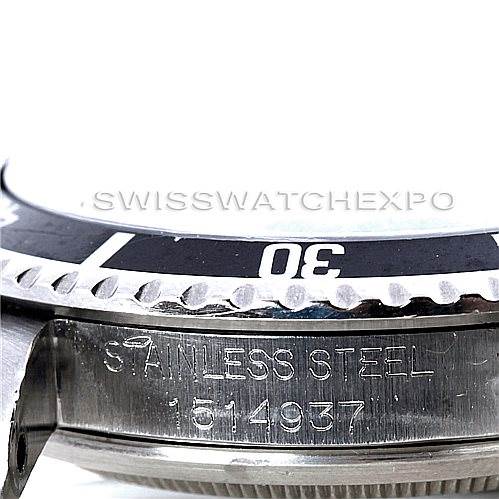 This close-up angle of the Rolex Vintage Collection 5512 Men's Stainless Steel  5512 Men's Stainless Steel  watch shows the bezel and the serial number engraved on the stainless steel case.