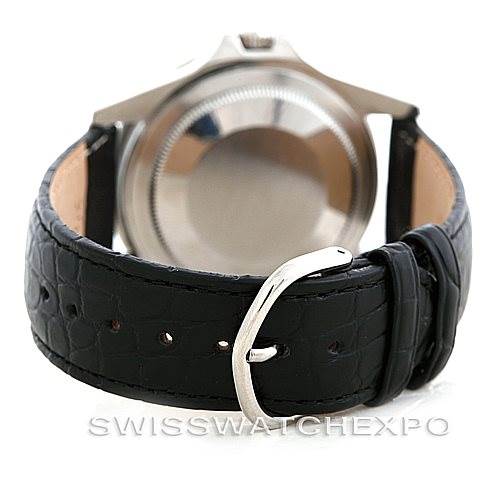 The image shows the back of a Rolex Vintage Collection 1675 Men's Stainless Steel Black Dial 1675 Men's Stainless Steel Black Dial watch featuring a black leather strap and metal buckle.