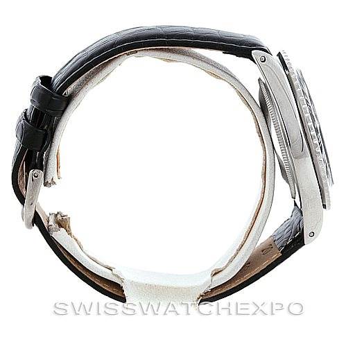 The image shows a side view of the Rolex Vintage Collection 1675 Men's Stainless Steel Black Dial 1675 Men's Stainless Steel Black Dial watch, focusing on the case, dial, and black leather strap.