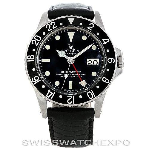 The image shows a front view of the Rolex GMT Master Vintage Collection watch, displaying the dial, bezel, and part of the leather strap.