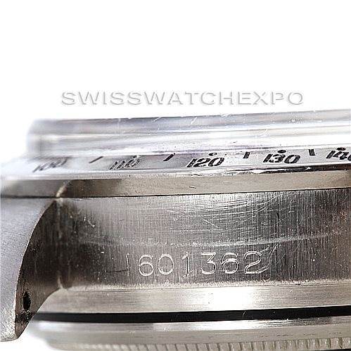 This image shows a close-up side angle of the case, bezel, and engraved serial number of the Rolex Vintage Collection 6239 Men's Stainless Steel Silver Dial 6239 Men's Stainless Steel Silver Dial watch.