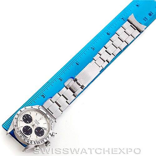 The image shows a top-down view of a Rolex Vintage Collection 6239 Men's Stainless Steel Silver Dial 6239 Men's Stainless Steel Silver Dial watch placed next to a blue ruler.