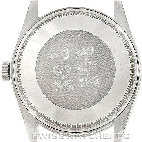 The image shows the back case of a Vintage Collection model by Rolex from a top-down angle.