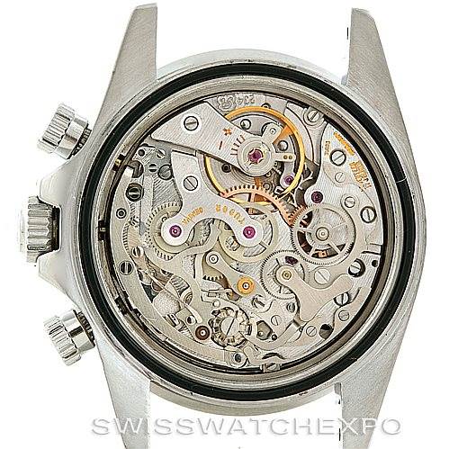 The image shows the back case removed, revealing the intricate mechanical inner workings of the Vintage Collection Rolex watch.