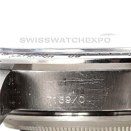 This image shows a close-up of the case side and serial number engraving of a Rolex Vintage Collection 7159 Men's Stainless Steel Grey Dial 7159 Men's Stainless Steel Grey Dial watch.