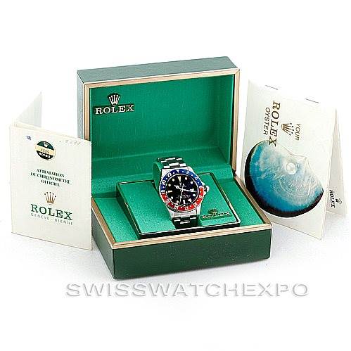 The image shows a Rolex Vintage Collection 1675 Men's Stainless Steel Black Dial 1675 Men's Stainless Steel Black Dial watch in its box with accompanying booklets displayed from a frontal angle.