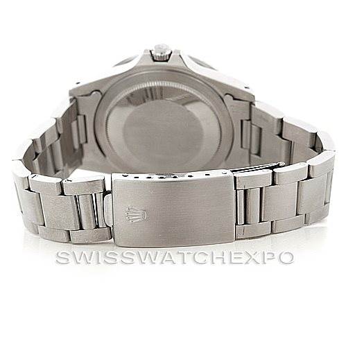 This image shows the back of a Vintage Collection Rolex watch, including the case back and partially open stainless steel bracelet.