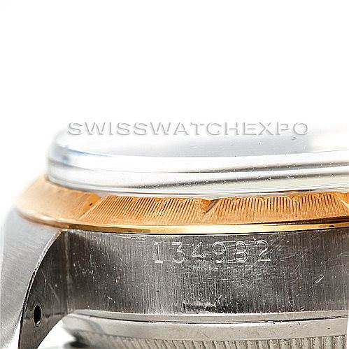 This image shows a close-up side view of the case and bezel of a Rolex Vintage Collection 6582 Men's Steel and Gold (two tone) Silver Dial 6582 Men's Steel and Gold (two tone) Silver Dial model, highlighting its serial number.