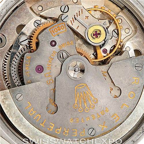 This close-up angle shows the intricate movement and rotor of a Rolex Vintage Collection 6582 Men's Steel and Gold (two tone) Silver Dial 6582 Men's Steel and Gold (two tone) Silver Dial watch.