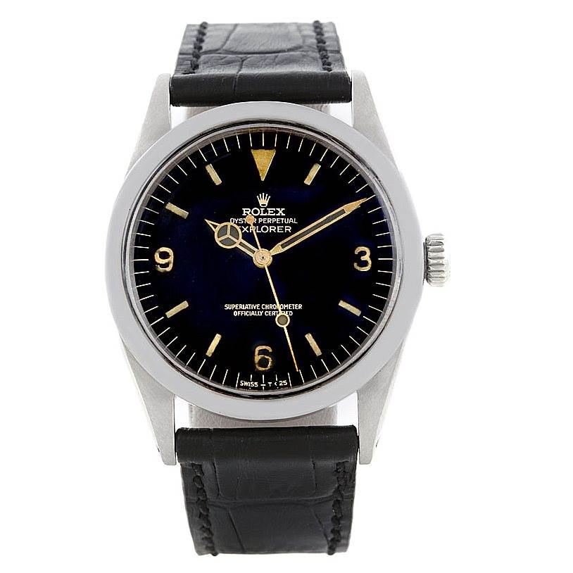 The Vintage Collection Rolex Oyster Perpetual Explorer watch is displayed from a front view, showing the black dial and leather strap.