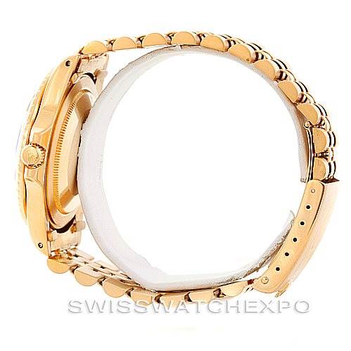 The image shows a side view of the Rolex Vintage Collection 1675 Men's Yellow Gold Brown Dial 1675 Men's Yellow Gold Brown Dial watch, highlighting the band, clasp, case, and crown.