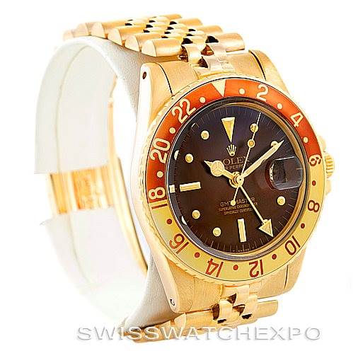 The image shows a Vintage Collection Rolex watch from a 3/4 front angle, highlighting the face, bezel, and bracelet.