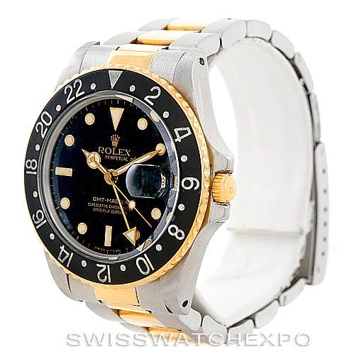 The image shows a Rolex Vintage Collection 16753 Men's Stainless Steel Black Dial 16753 Men's Stainless Steel Black Dial GMT-Master watch, featuring its bezel, face, crown, and part of the bracelet.