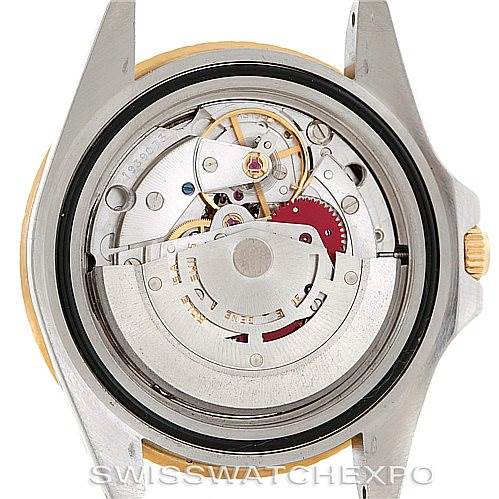 The image shows the internal mechanical movement of a Rolex Vintage Collection 16753 Men's Stainless Steel Black Dial 16753 Men's Stainless Steel Black Dial watch from a back angle.