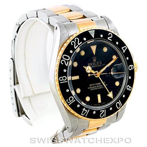 The Vintage Collection Rolex watch is shown from an angled view displaying the dial, bezel, and two-tone bracelet.