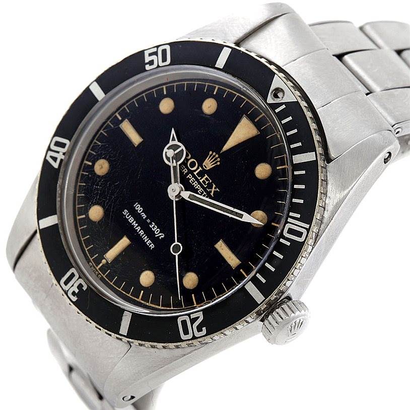 This image shows a side-angle view of a Rolex Vintage Collection 5508 Men's Stainless Steel Black Dial 5508 Men's Stainless Steel Black Dial Submariner, highlighting the bezel, dial, and bracelet.