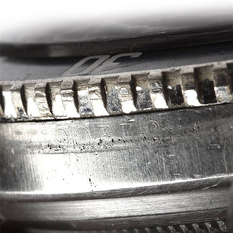 This close-up image of the Rolex Vintage Collection 5508 Men's Stainless Steel Black Dial 5508 Men's Stainless Steel Black Dial watch shows a detailed view of the bezel and case with visible engravings.